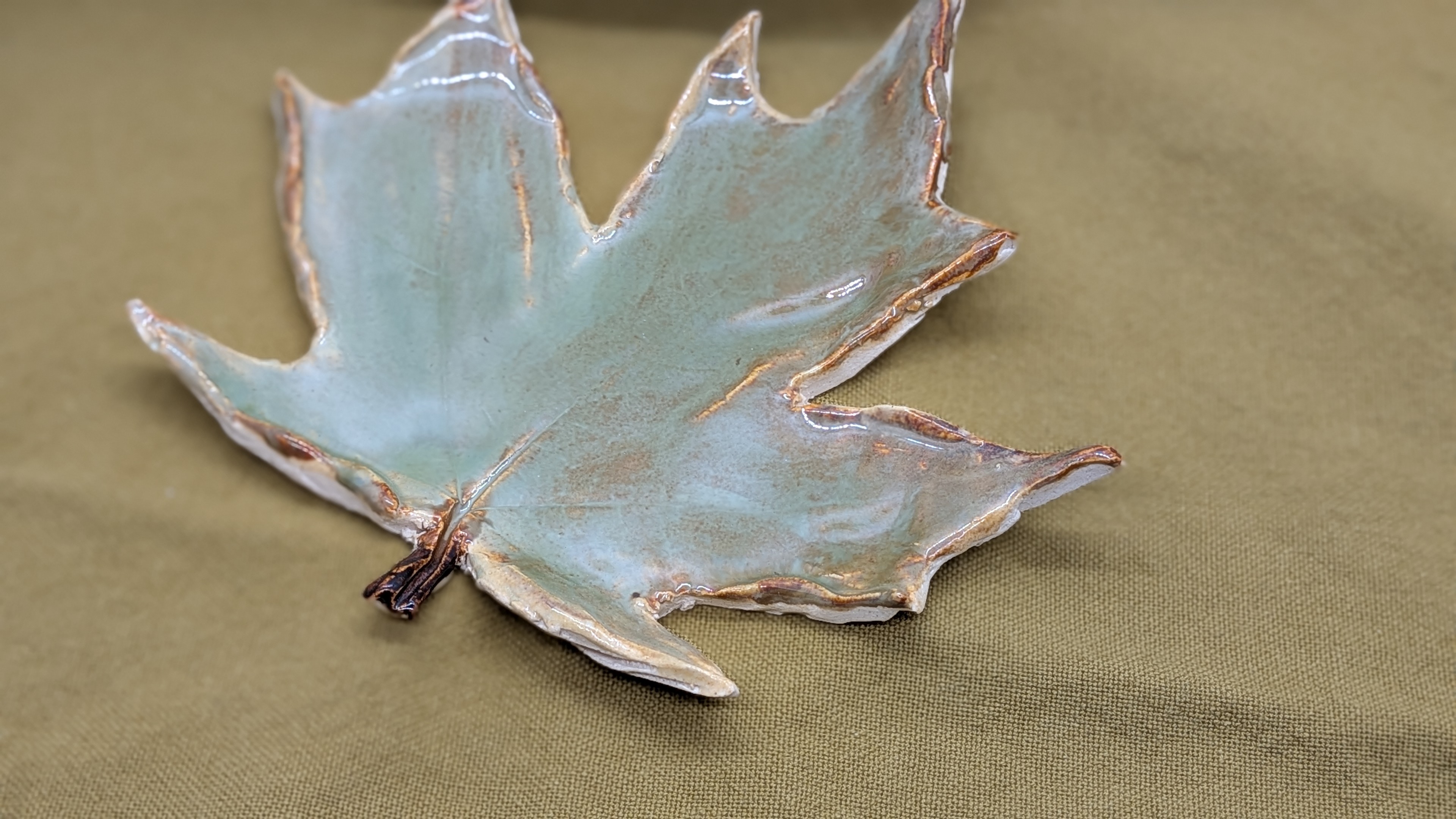 Leaf Spoon Rests - If I were you, I'd definitely set one of these lovely leaves next to a candle, in a special spot where you'd find yourself drinking some tea, and taking a break to read or meditate. This is a great gift for the mom in your life who loves bringing a little calm, nature-inspired joy into her daily routines.

Made with the leaves off the young maple trees in my yard!

Large leaves are $20 each; Small copper leaf is $10
 - 20