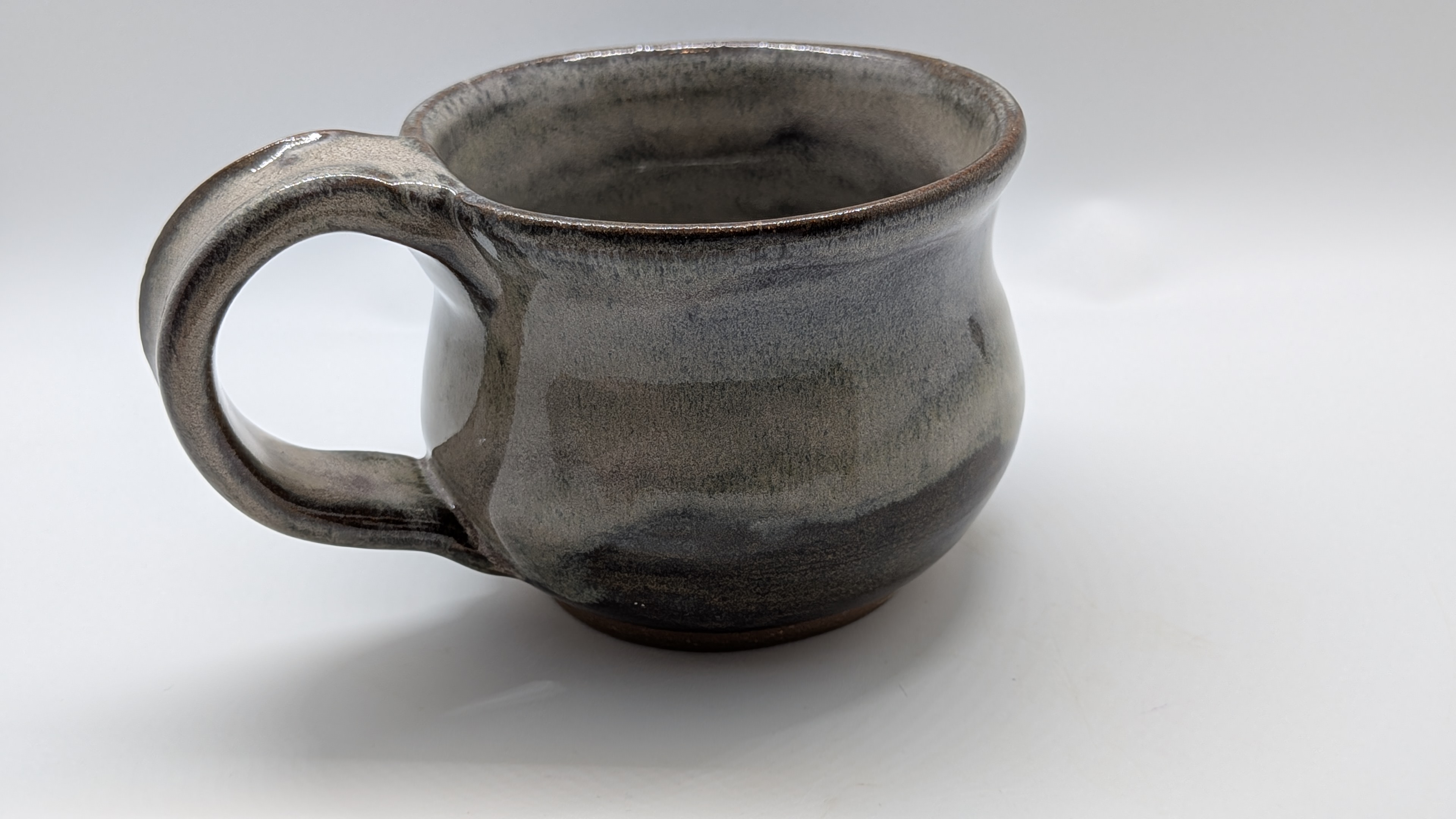 Cool Sepia Mug - Pairs beautifully with my other Cool Sepia pieces! The gorgeous, soft, earthy colors in this glaze combo look great in any space. This cup holds about 8 fl. oz. - 